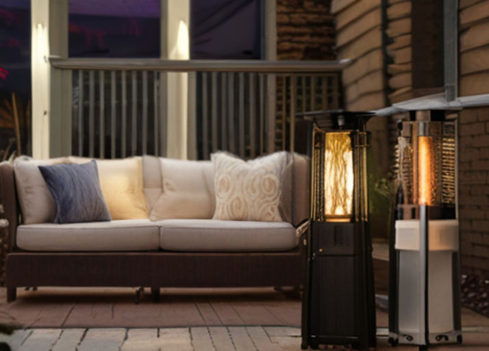 An inviting outdoor scene with glowing patio heaters casting warm light on a chilly evening, inviting viewers to imagine cozy gatherings under the stars.
